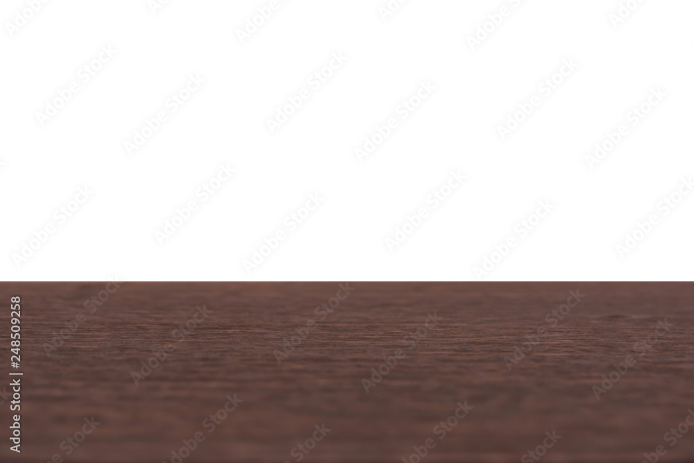 Empty dark wood table top isolated on white background with clipping path and copy space for display or montage your products Empty dark wood table top isolated on white background with clipping path and copy space for display or montage your products