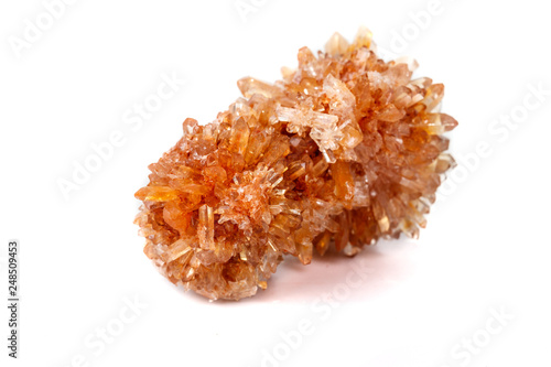 Macro of mineral stone Creedite on microcline on white background photo