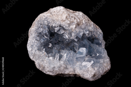 Obraz na plátne Celestine mineral stone macro on microcline on black background
