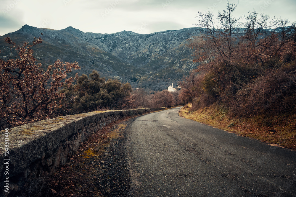 Road leading to church in mountains of Corsica