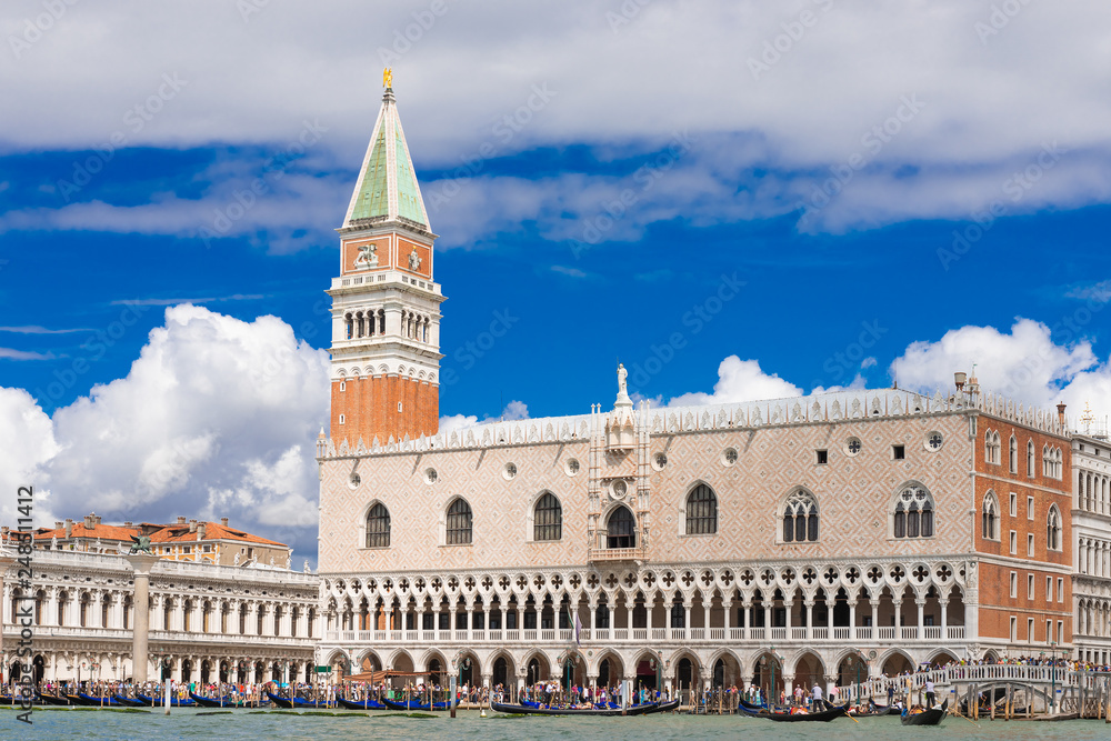 Venice landmark, view from sea of Piazza San Marco or st Mark square, Campanile and Ducale or Doge Palace. Italy