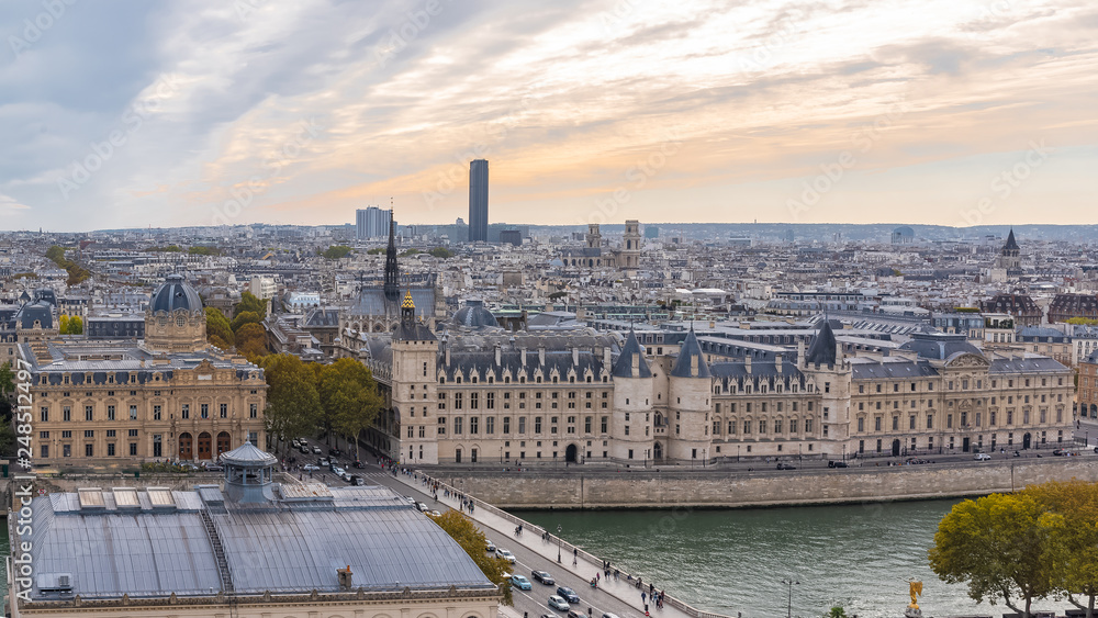 Paris, panorama of the Conciergerie on the ile de la Cite, on the river Seine, with the Montparnasse tower in background 