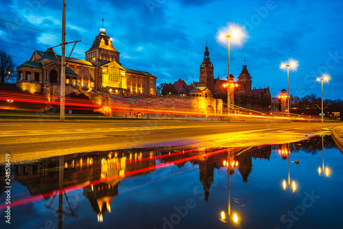 Szczecin monuments forming reflection on wet road