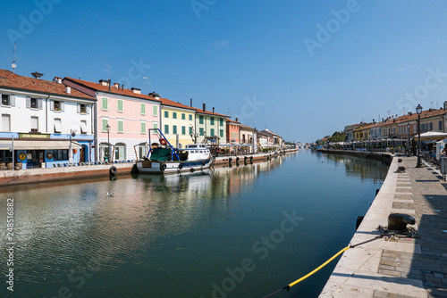 View of the Porto Leonardesco Canal of Cesenatico on a summer day, Emilia Romagna, Italy.