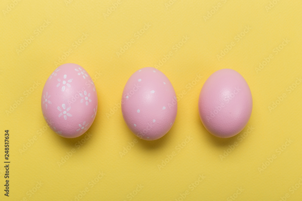 easter eggs on yellow pastel color background with space. Concept easter eggs on yellow pastel color background with space. Concept
