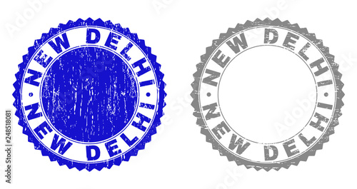 Grunge NEW DELHI stamp seals isolated on a white background. Rosette seals with grunge texture in blue and gray colors. Vector rubber stamp imprint of NEW DELHI text inside round rosette.