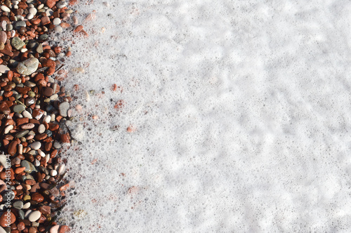 sea foam and pebbles