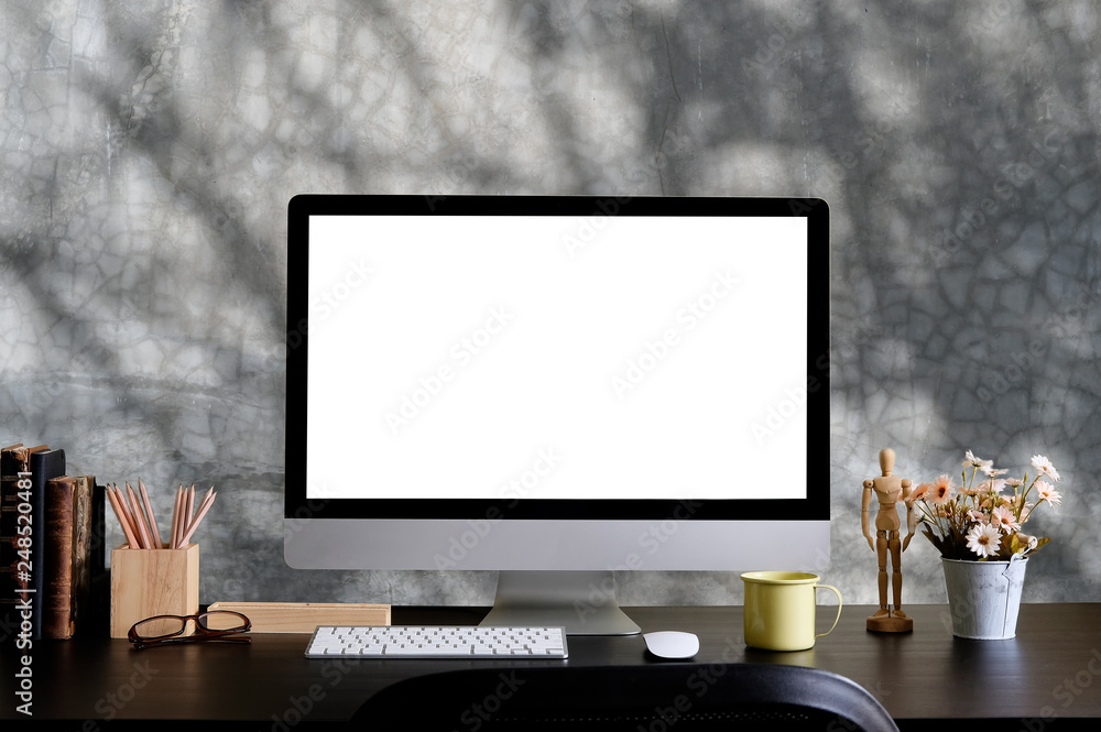 Fototapeta premium Mockup computer and office supplies on creative desk.