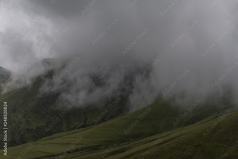 Beautiful landscape, mountain in the clouds.