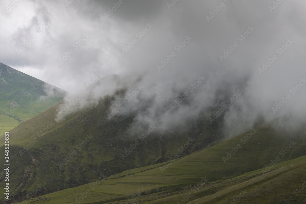 Beautiful landscape, mountain in the clouds.