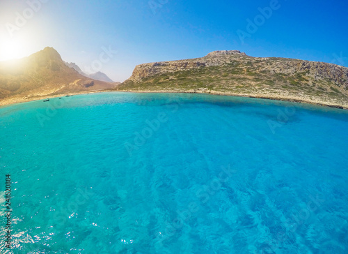 Balos, Crete island, Greece. Fisheye view on the beautiful crystal clear water and rock.