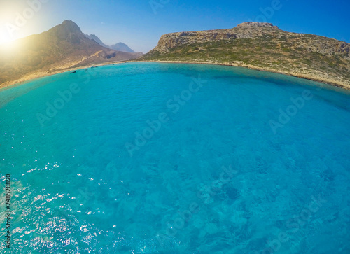 Balos, Crete island, Greece. Fisheye view on the beautiful crystal clear water and rock.