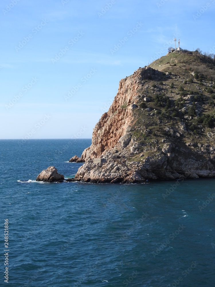 Rocks mountains sea waves