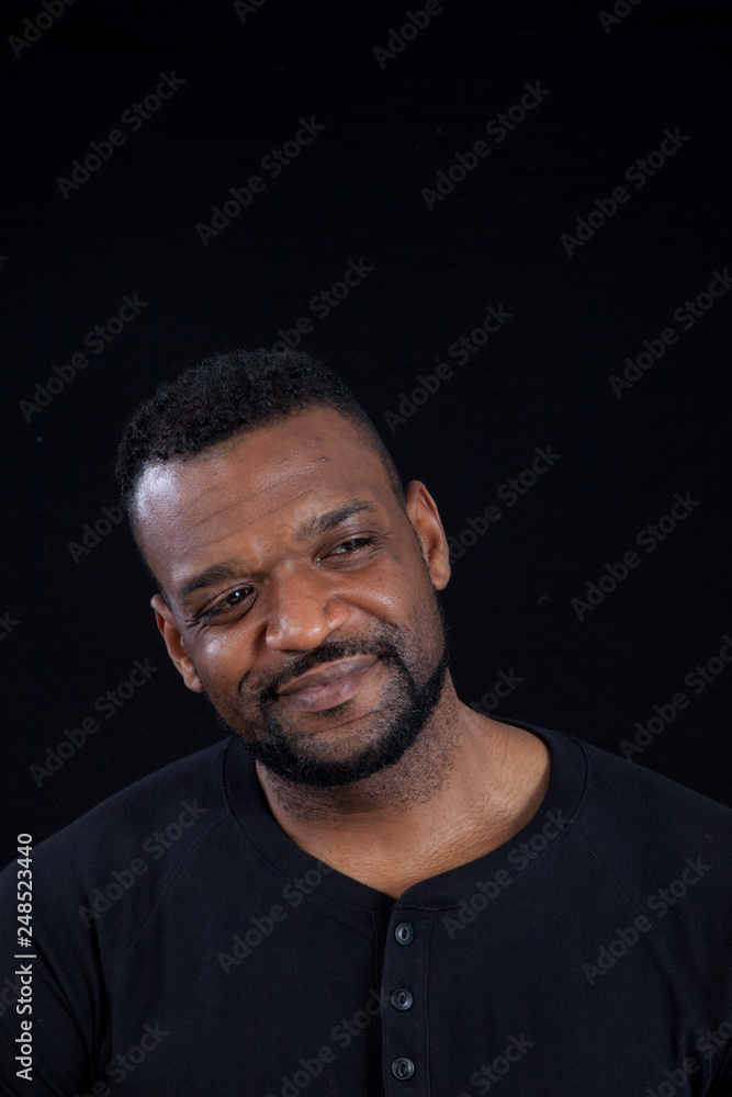 Smiling Black man in black shirt Smiling Black man in black shirt