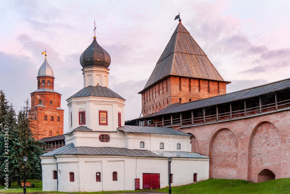 Intercession church of the Mother of God, built in XVI century, by the tower and Kremlin walls, Veliky Novgorod, Russia