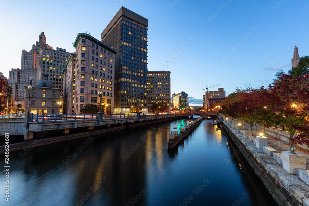 Providence, Rhode Island, United States - October 25, 2018: Scenic view of a beautiful modern downtown city during a colorful night after sunset.