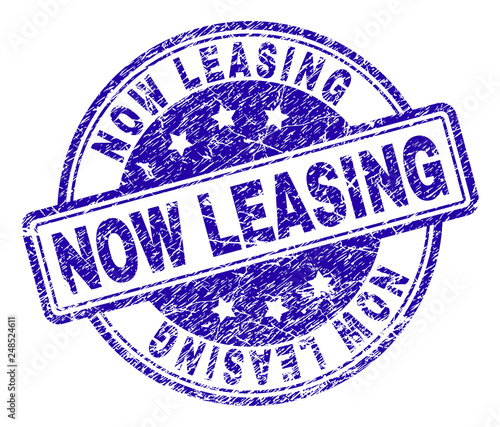 NOW LEASING stamp seal watermark with distress texture. Designed with rounded rectangles and circles. Blue vector rubber print of NOW LEASING tag with corroded texture.