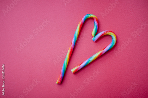 Sweets in the shape of a heart on a red background. Valentine's Day