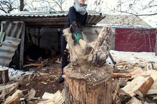 Girl chopping wood