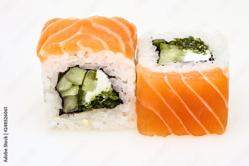 Two pieces of Japanese sushi with salmon isolated on a white background Two pieces of Japanese sushi with salmon isolated on a white background
