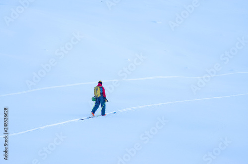 Ski touring in harsh winter condition. Winter alpine landscape