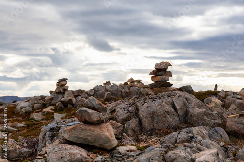 Pile of Rocks on the Atlantic Ocean Coast during a cloudy evening. Taken in Newfoundland, Canada.