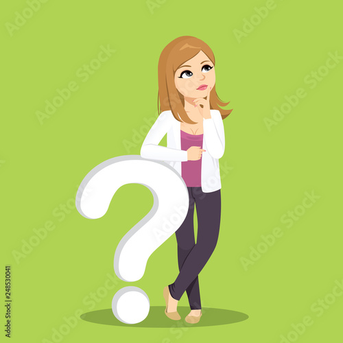 Pensive woman looking up standing thinking while leaning on big white question mark