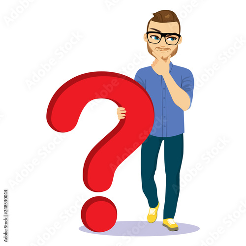Young handsome man holding big red question mark