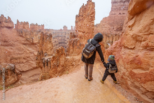 Canvas Print Mother with son are hiking in Bryce canyon National Park, Utah, USA