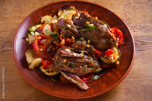 Slow cooker lamb with tomatoes, zucchini, eggplant, onion and garlic. horizontal