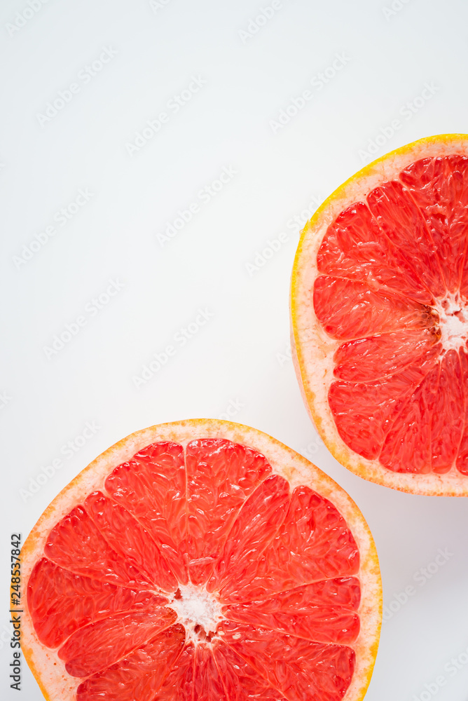 Fresh half grapefruit isolated on white background. Fresh half grapefruit isolated on white background.