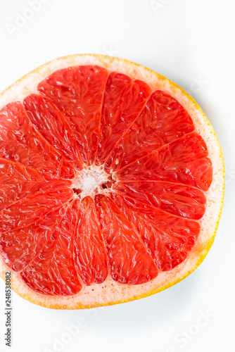 Fresh half grapefruit isolated on white background.