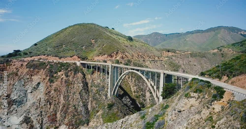 Amazing panoramic aerial shot of amazing Bixby Canyon Bridge and Highway 1, famous USA landmark in Big Sur California. Amazing panoramic aerial shot of amazing Bixby Canyon Bridge and Highway 1, famous USA landmark in Big Sur California.