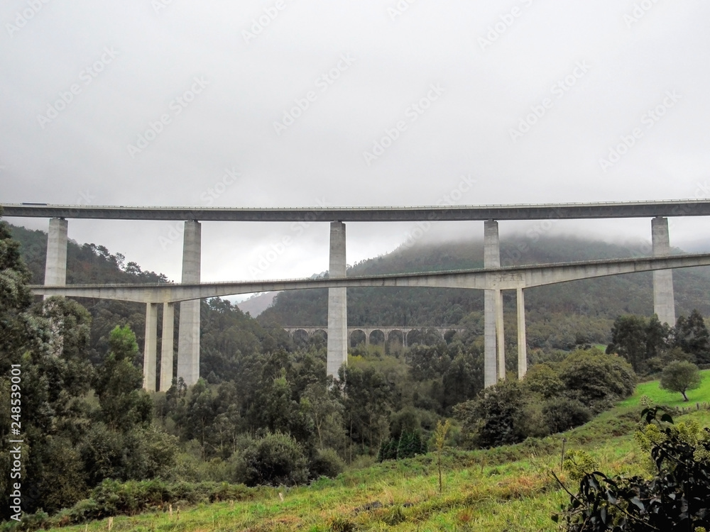 Highway monumental bridge in Asturias, Camino del Norte, the Northern Way of Saint James in Spain Highway monumental bridge in Asturias, Camino del Norte, the Northern Way of Saint James in Spain