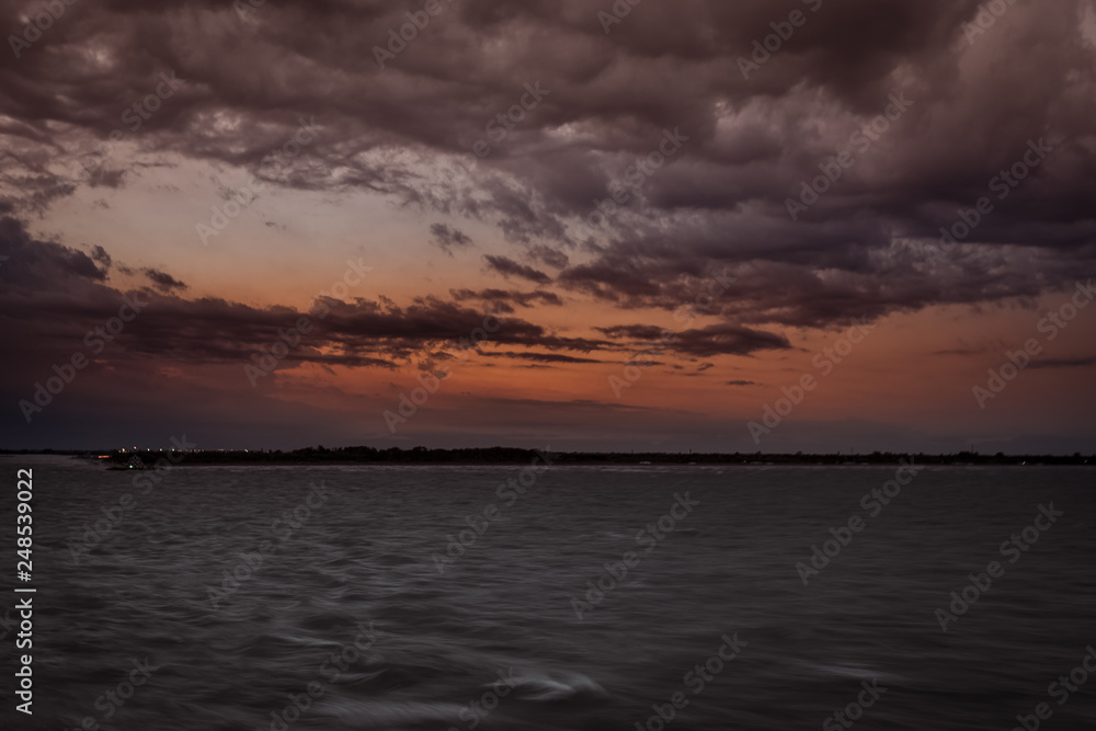 Panorama of Punta Sabbioni lighthouse in the Venice lagoonduring a thunderstorm Panorama of Punta Sabbioni lighthouse in the Venice lagoonduring a thunderstorm