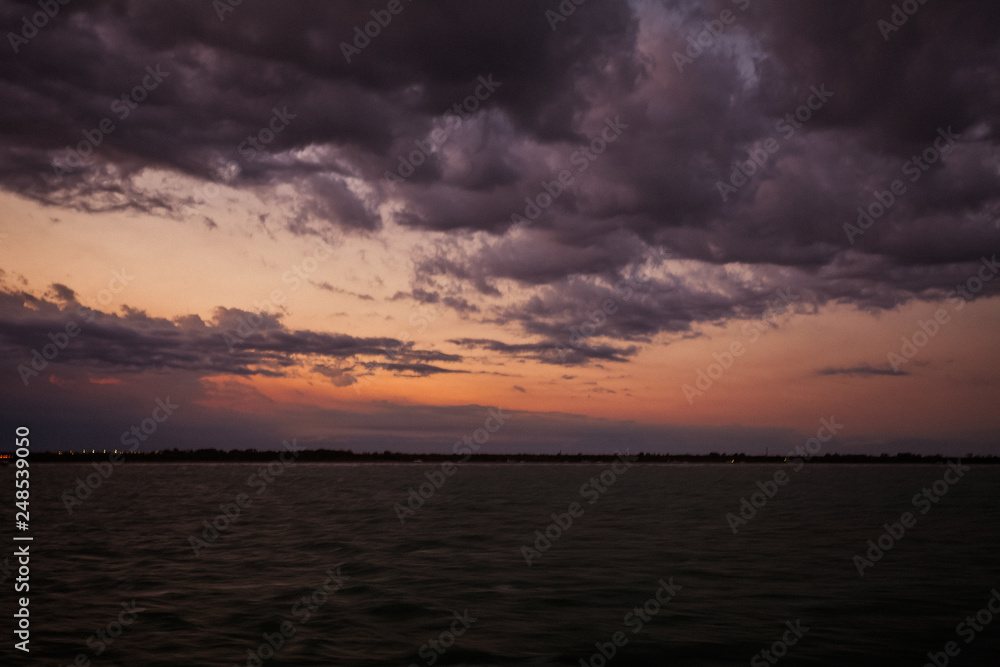 View of Punta Sabbioni lighthouse in the Venice lagoonduring a thunderstorm View of Punta Sabbioni lighthouse in the Venice lagoonduring a thunderstorm