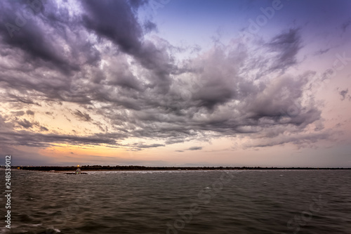 Panorama of Punta Sabbioni lighthouse in the Venice lagoonduring a thunderstorm