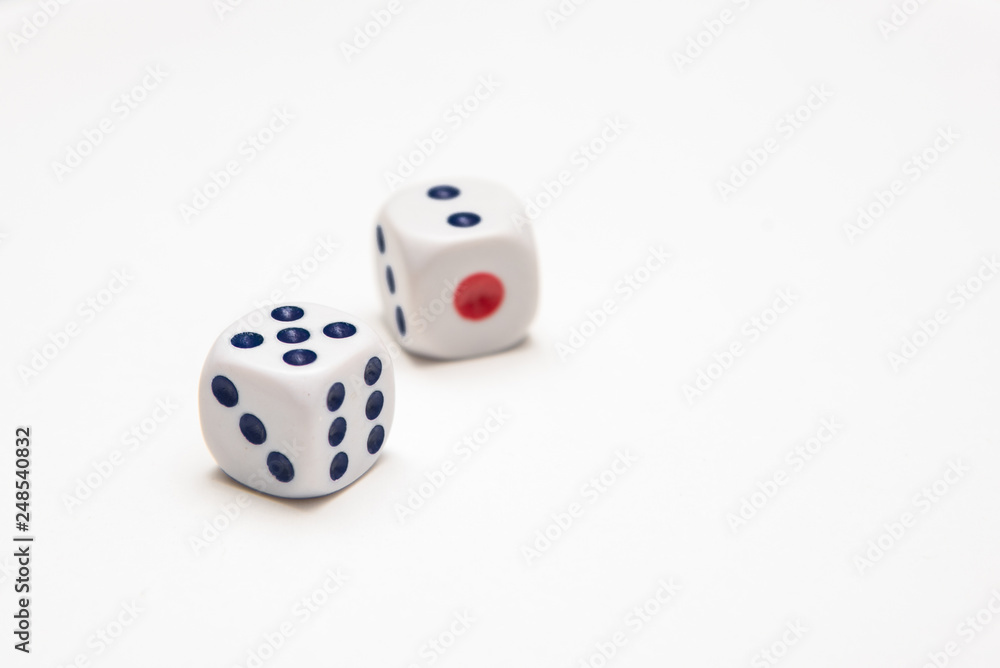 Two playing dice on a white background in the studio Two playing dice on a white background in the studio
