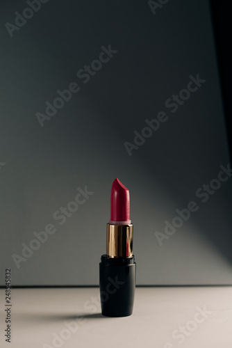 Pink lipstick on modern background. Product and make up  concept