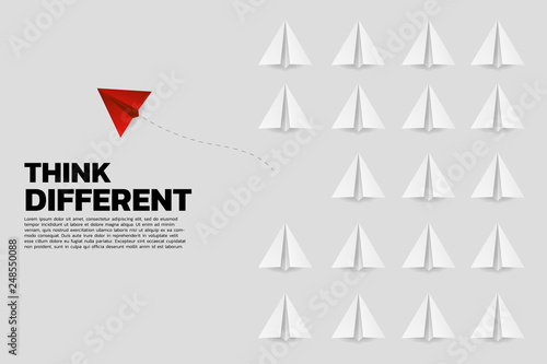 red origami paper airplane going out from group of white. Business Concept of disruption and vision mission.