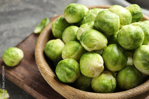 Bowl of Brussels sprouts on table, closeup