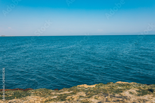Sea or ocean and rocks at the summer season sunny day. Beautiful scenic nature landscape. © Hakan Tanak