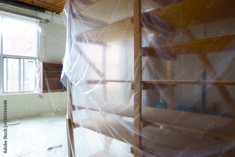 Empty space filled up with polythene, just moving in or moving out or ready for renovation.