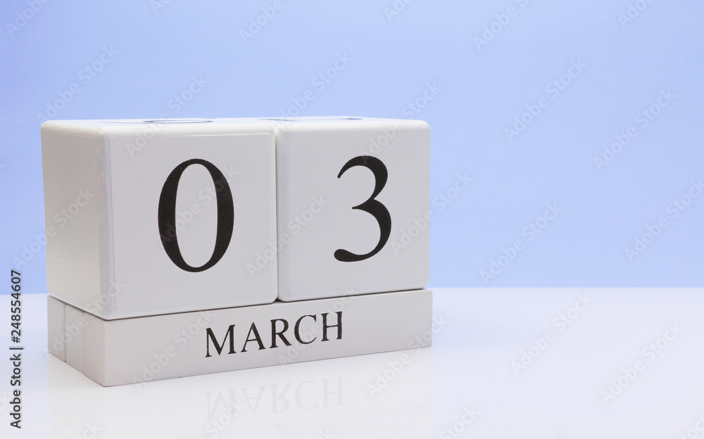 March 03st. Day 03 of month, daily calendar on white table with reflection, with light blue background. Spring time, empty space for text March 03st. Day 03 of month, daily calendar on white table with reflection, with light blue background. Spring time, empty space for text