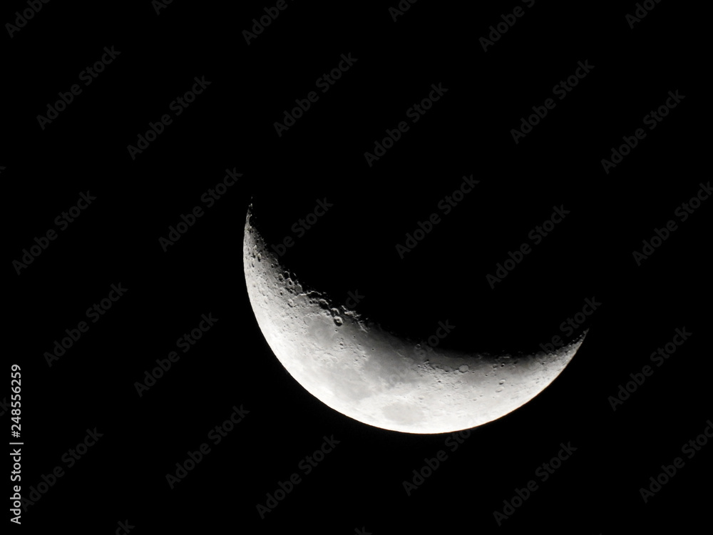 Crescent Moon / The Moon as it appears early in its first quarter or late in its last quarter, when only a small arc-shaped section of the visible portion is illuminated by the Sun Crescent Moon / The Moon as it appears early in its first quarter or late in its last quarter, when only a small arc-shaped section of the visible portion is illuminated by the Sun