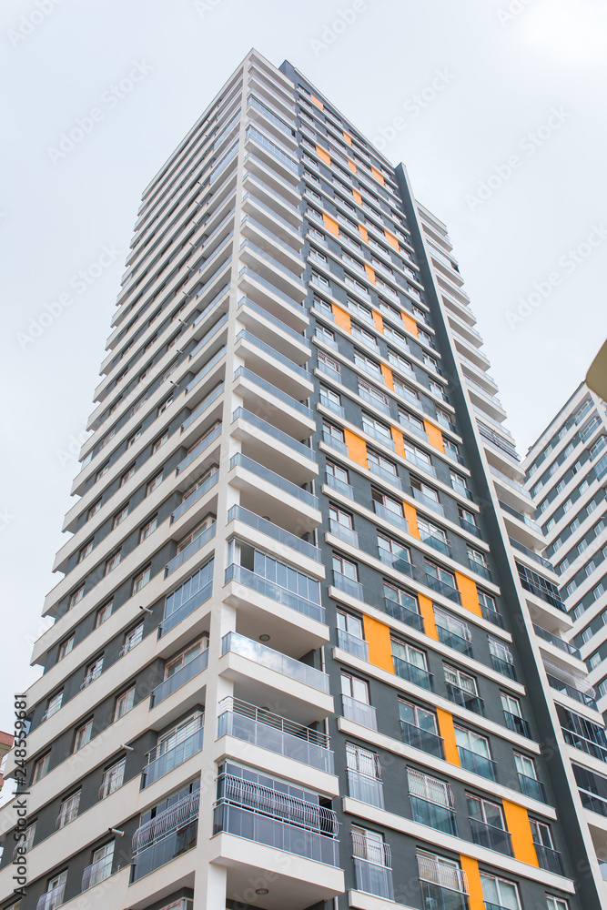 New multi-storey residential building apartment houses. Mortgage and construction background concept image. New multi-storey residential building apartment houses. Mortgage and construction background concept image.