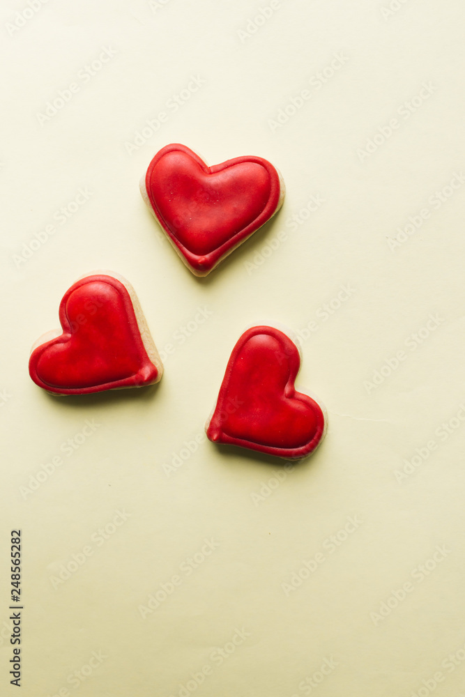 Cookies in heart shape with red glaze , valentines day celebration Cookies in heart shape with red glaze , valentines day celebration