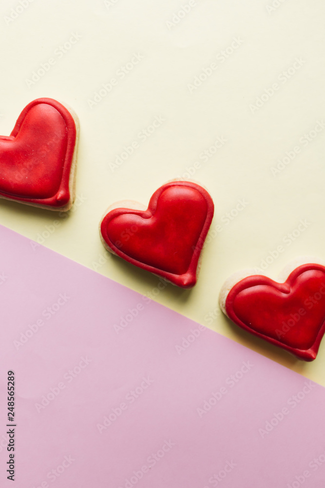 Cookies in heart shape with red glaze , valentines day celebration Cookies in heart shape with red glaze , valentines day celebration