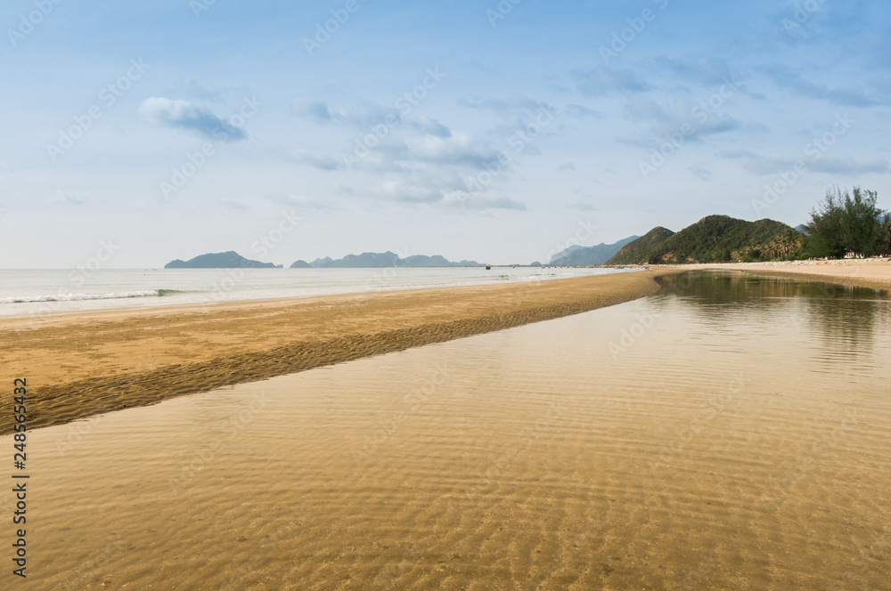 The sea is separated by sand dunes and mountains in the beautiful sky. The sea is separated by sand dunes and mountains in the beautiful sky.