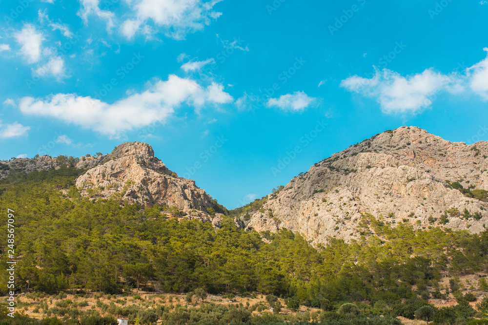 clouds over the mountains on the blue sky clouds over the mountains on the blue sky